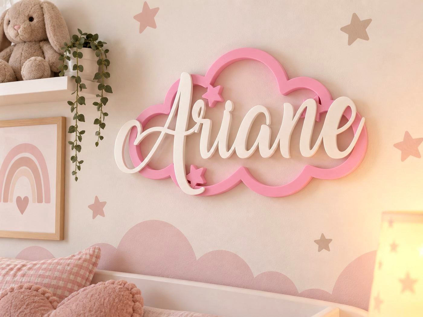 Nube rosa con el nombre Ariane en blanco